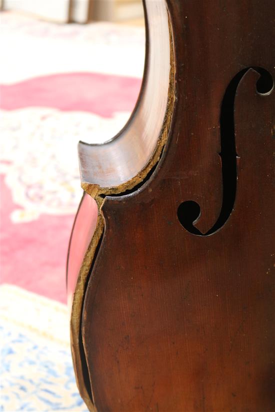 A full sized cello bearing label Arthur Richardson ... and two bows (one silver mounted), the other signed Wilhelm ... uhl